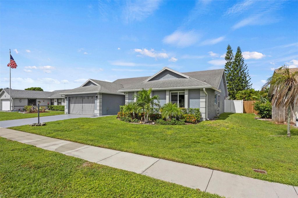 Photo of 8441 Winnipesaukee Way, Lake Worth, FL 33467 (MLS # F10530092)