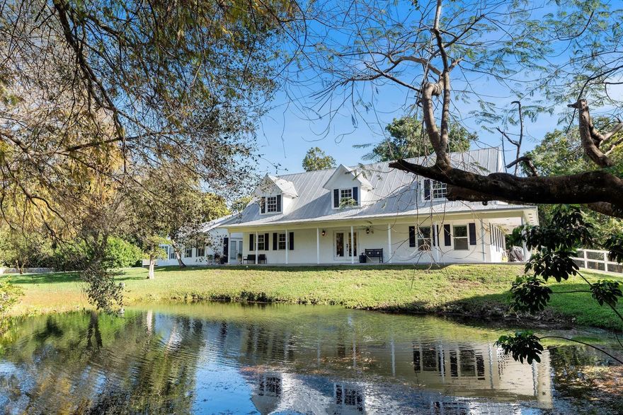 ***TUCKED AWAY AND HIDDEN ON ONE OF THE MOST BEAUTIFUL STREETS IN SUNSHINE RANCHES!!!*** A STORYBOOK SETTING,OFFERING A TOTAL OF 5,795 SF FINISHED W/4 BEDMS &4.5 BATHS. THIS PRIVATE ESTATE SITS ON 2.5 SERENE ACRES AT THE END OF A PRIVATE CUL-DE-SAC. COMPLETED W/MATURE OAK TREES,LILY PONDS,SWEEPING LAWNS &WRAPAROUND PORCH. OVERSIZED COMPOSITE DECKS & A ENCLOSED SUN ROOM OVERLOOK THE GROUNDS, PERFECT FOR THOSE WHO LIKE ENTERTAIN. INSIDE,AN 18 FT VAULTED CEDAR GREAT ROOM WITH LOFT OPENS TO THE FAMILY ROOM, SUN ROOM, AND UPDATED KITCHEN WITH OVERSIZED COUNTRY ISLAND. TWO PRIVATE SUITES ON OPPOSITE WINGS,INCLUDING A SPA-INSPIRED PRIMARY AND A GUEST/IN-LAW SUITE WITH PRIVATE ENTRANCE AND DECK. PLENTY OF ROOM TO EXPAND. EXTRA-LONG DRIVEWAY PARKS 8–10 CARS. A RARE SANCTUARY MINUTES FROM CITY LIFE!