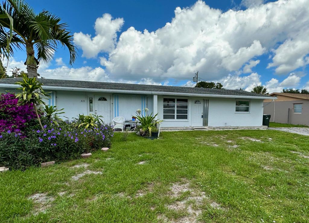 Photo of 416 SE Fini Drive, Stuart, FL 34996 (MLS # R10892972)