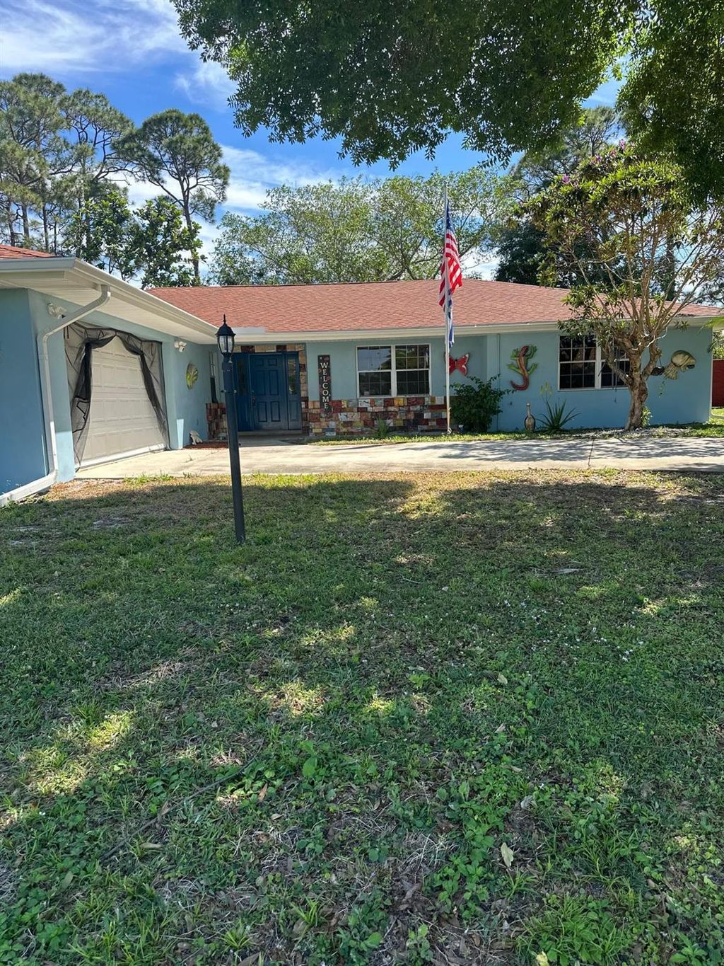 Photo of 1681 SE Fairfield Street, Port Saint Lucie, FL 34983 (MLS # R11068018)