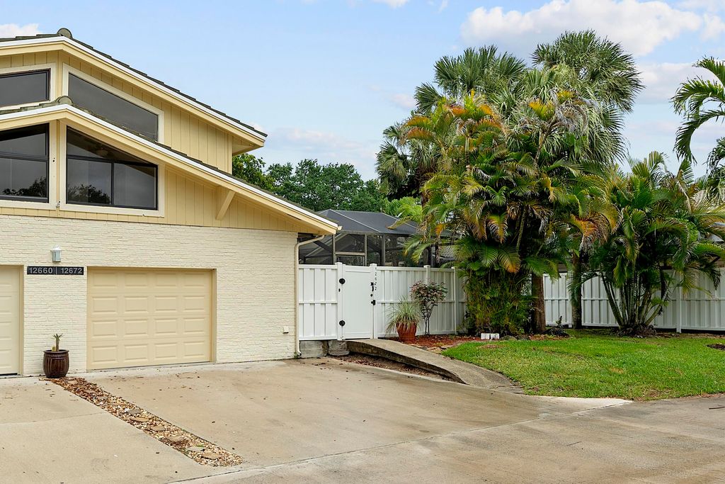 Photo of 12672 Woodmill Drive, Palm Beach Gardens, FL 33418 (MLS # B26018326)