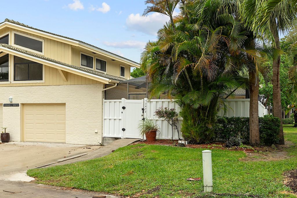 Photo of 12672 Woodmill Drive, Palm Beach Gardens, FL 33418 (MLS # B26018326)