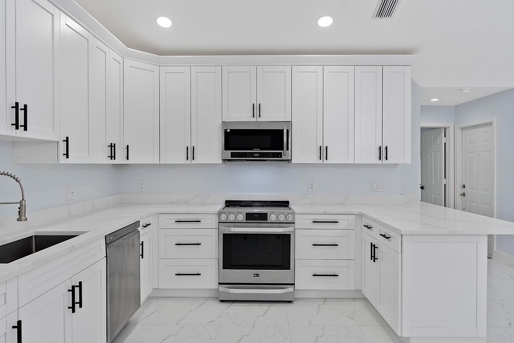 Photo of 12672 Woodmill Drive, Palm Beach Gardens, FL 33418 (MLS # B26018326)
