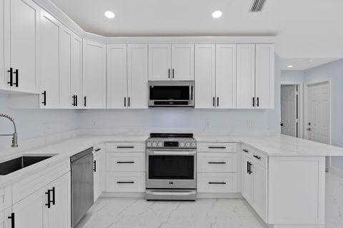 Photo of 12672 Woodmill Drive, Palm Beach Gardens, FL 33418 (MLS # B26018326)