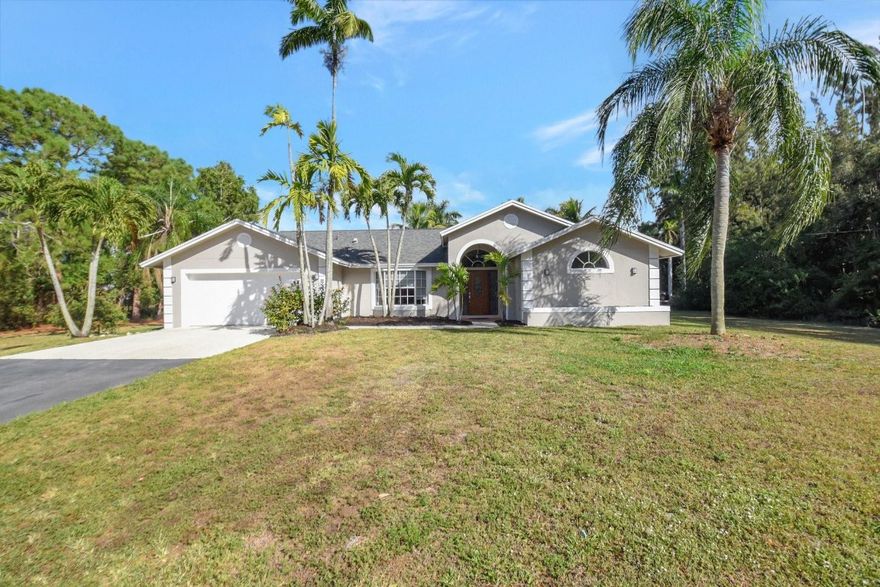 GORGEOUS RANCH ON 1.20 ACRES SURROUNDED BY TALL PINES, COMPLETELY UPGRADED ALL NEW EVERYTHING. KITCHEN, BATHROOMS, PAINT INSIDE AND OUT. NOTHING TO TO DO BUT MOVE IN AND ENJOY QUIET COUNTRY LIVING WITH EASY ACCESS TO ALL MAJOR HIGHWAYS AND ALL SOUTH FLORIDA DIRECTIONS, AIRPORTS, SHOPPING. STORE ALL YOUR TOYS IN PEACE WITH NO HOA. NEW ROOF 2021. HORSE COUNTRY ALL AROUND LOCATED EAST OF ARDEN AND SOUTH OF WEST GATE. HOME IS NOT ON A LOCKBOX AND MUST BE SHOWN BY THE LISTING AGENT.