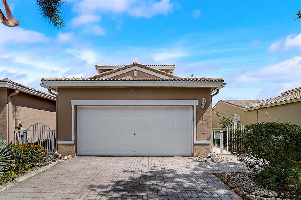 Photo of 2186 Man Of War, West Palm Beach, FL 33411 (MLS # R10784372)