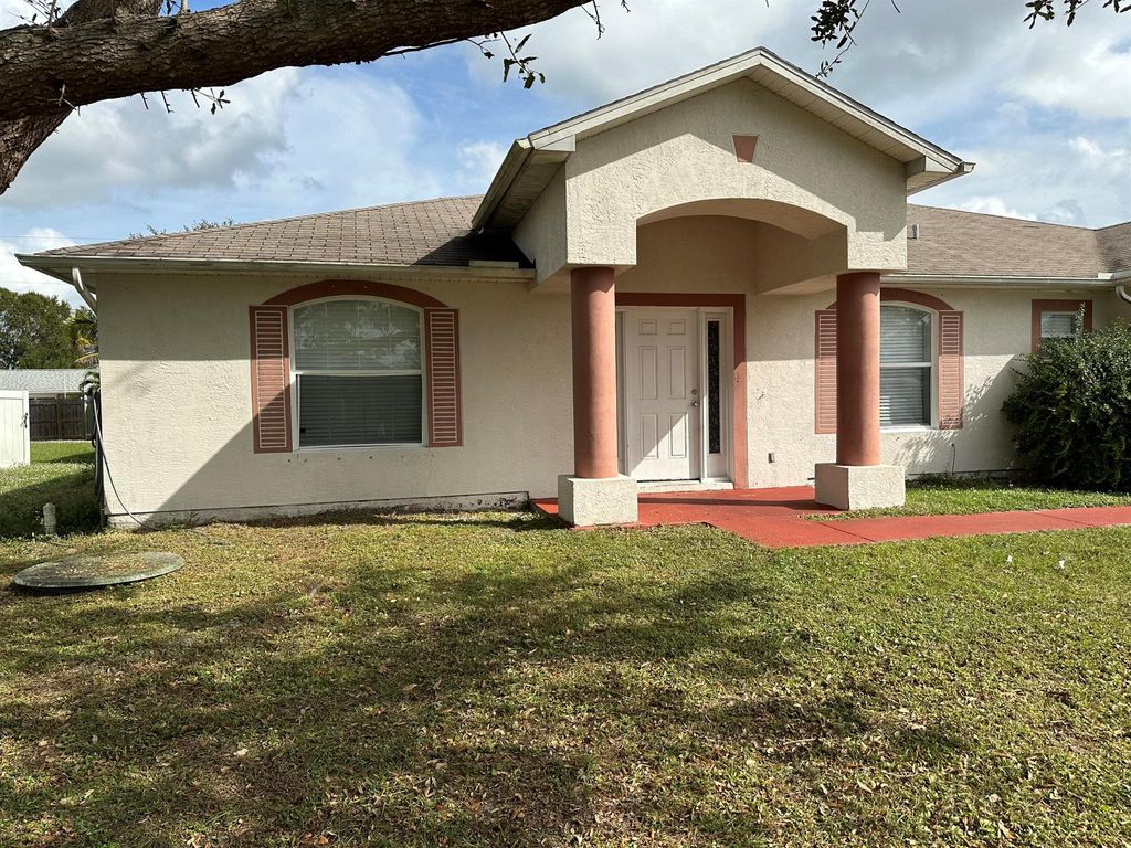 Photo of 1281 SE Sandia Drive, Port Saint Lucie, FL 34983 (MLS # R10940276)