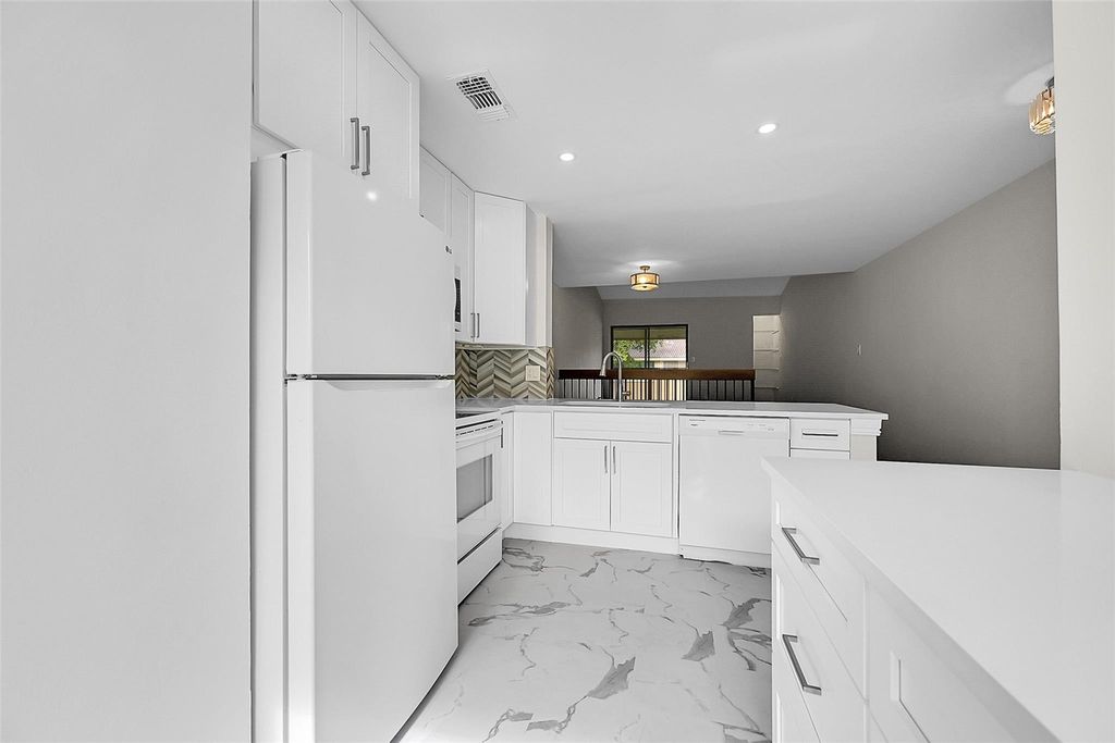 Photo of 2578 Riverside Dr #421, Coral Springs, FL 33065 (MLS # F10541953)