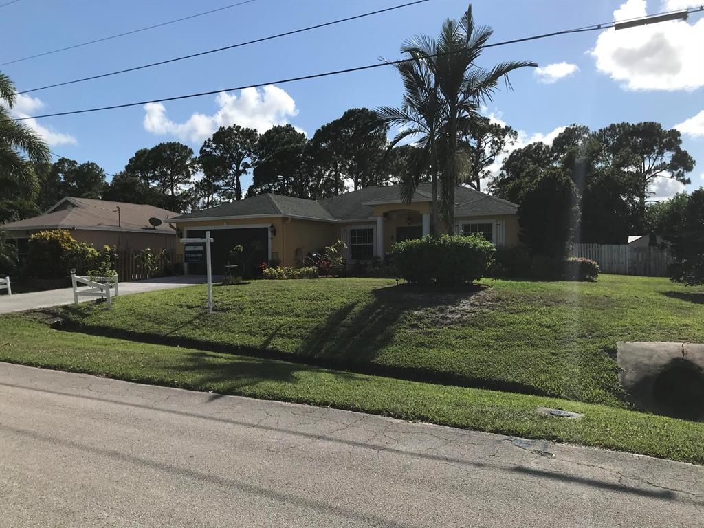 Photo of 4002 SW Hablow Street, Port Saint Lucie, FL 34953 (MLS # R10716290)