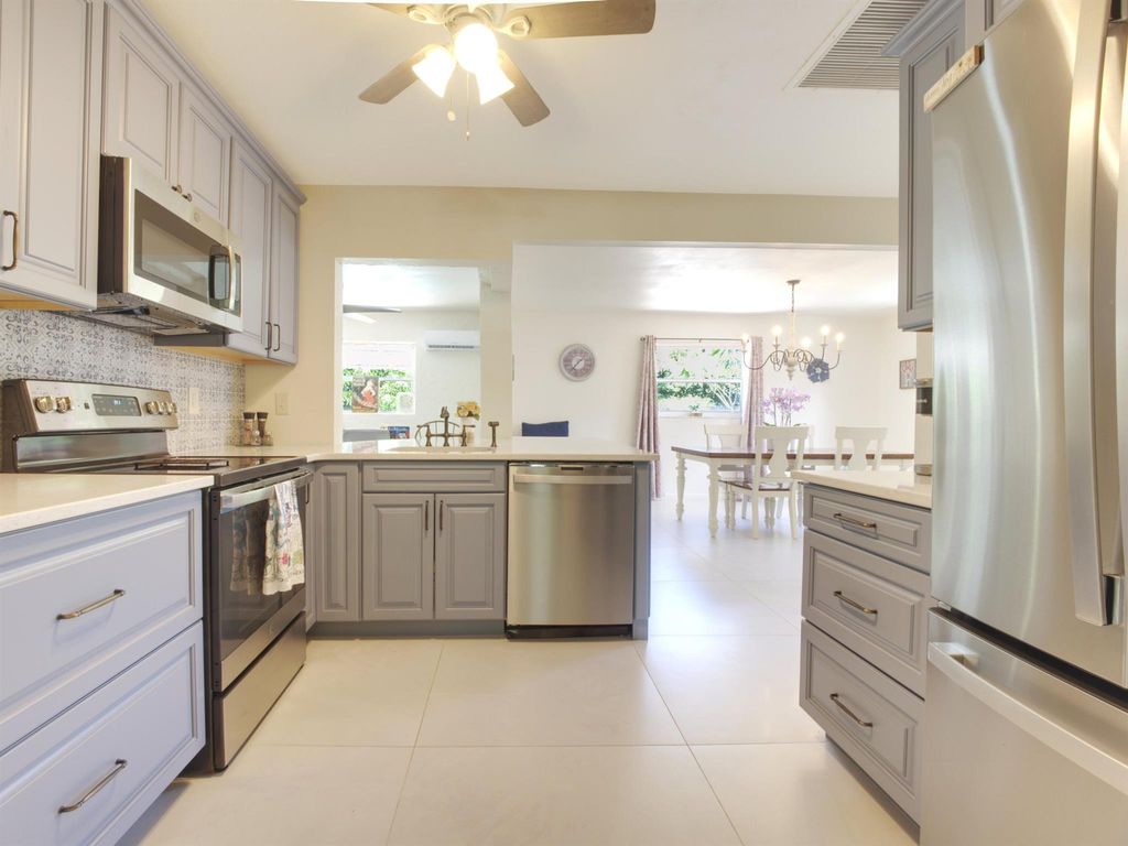 Photo of 218 S Sequoia Drive, West Palm Beach, FL 33409 (MLS # R11004667)