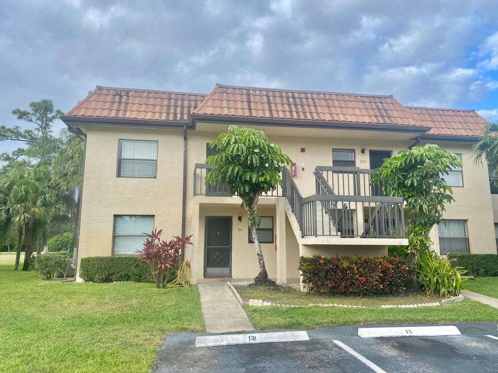 Photo of 7101 Golf Colony Court #202, Lake Worth, FL 33467 (MLS # R11058360)