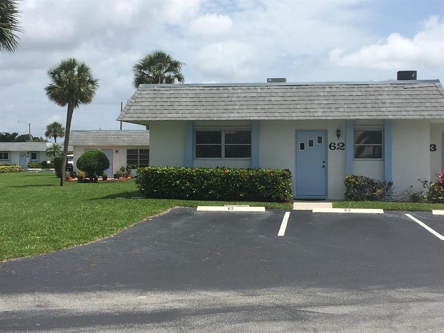 Beautiful corner villa with 2 master bedrooms, featuring 18 inch porcelain tile floor laid diagonally, new kitchen, ceiling fans in every room, large laundry room, walk-in closets, and so much more! Newer roof which is maintained by the association, and 2 assigned parking spaces. This immaculate property is priced to sell! Move in ready. Water is included in the HOA fee.