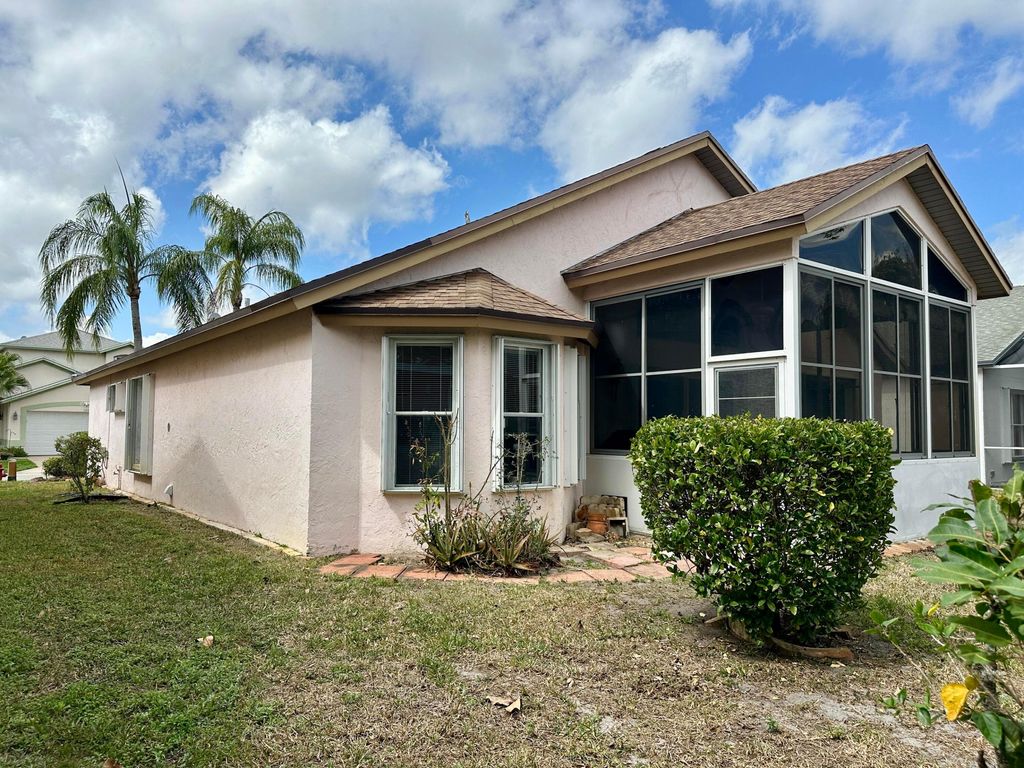 Photo of 119 Hammocks Court, Greenacres, FL 33413 (MLS # R11167631)