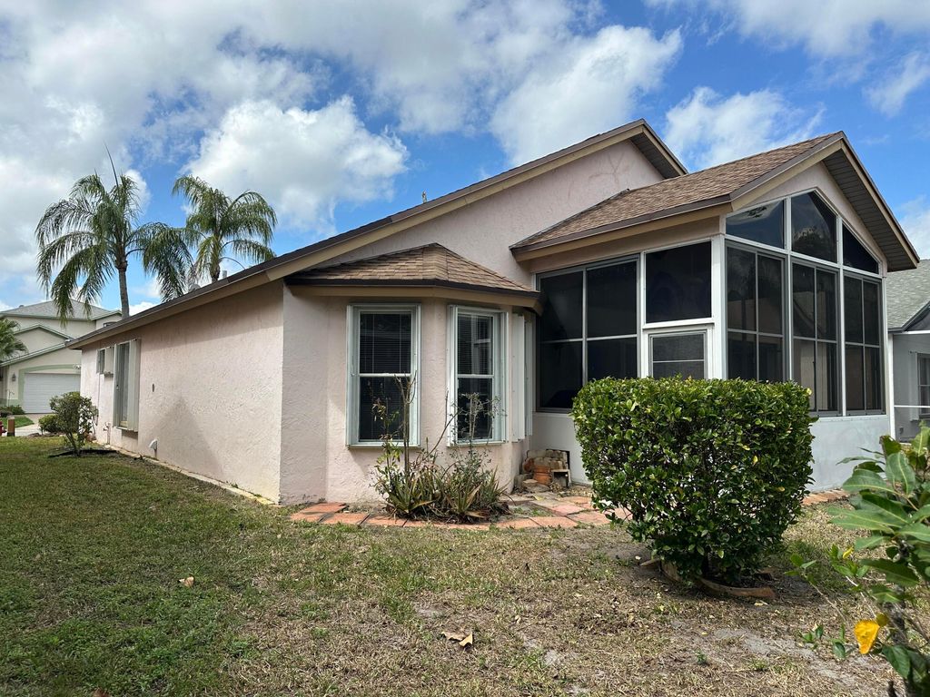 Photo of 119 Hammocks Court, Greenacres, FL 33413 (MLS # R11167631)