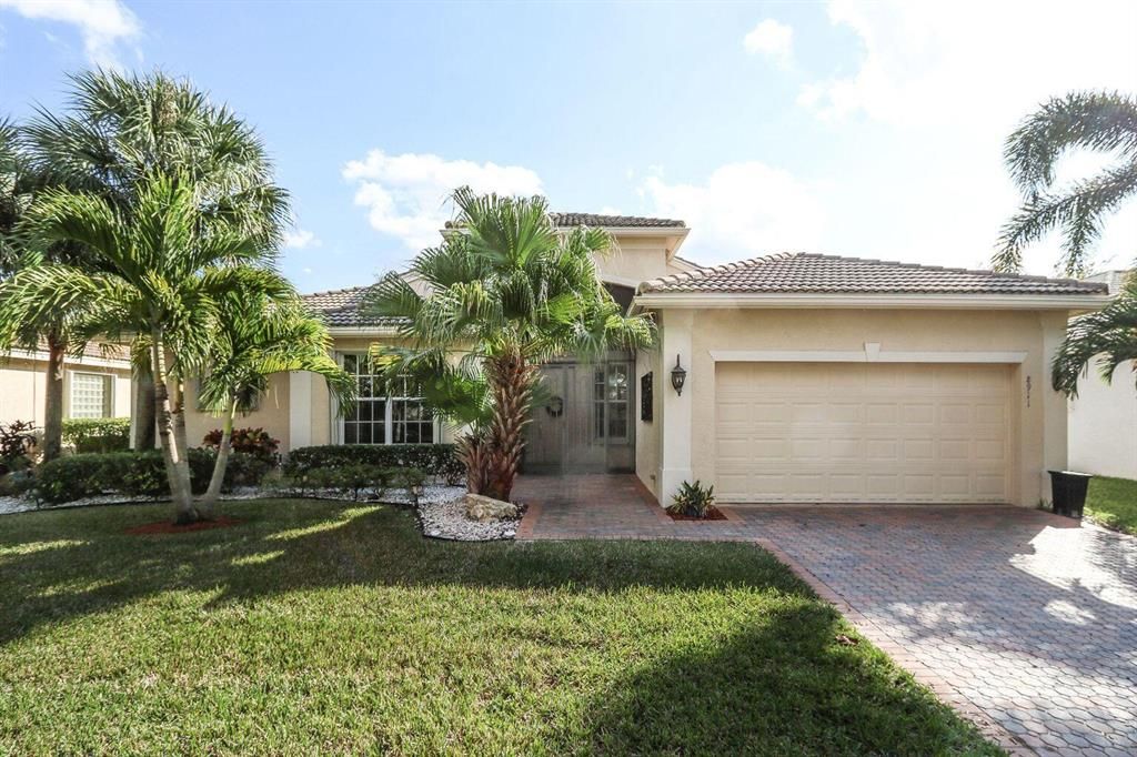Photo of 8911 Majorca Bay Drive Dr, Lake Worth Beach, FL 33467 (MLS # R10762860)