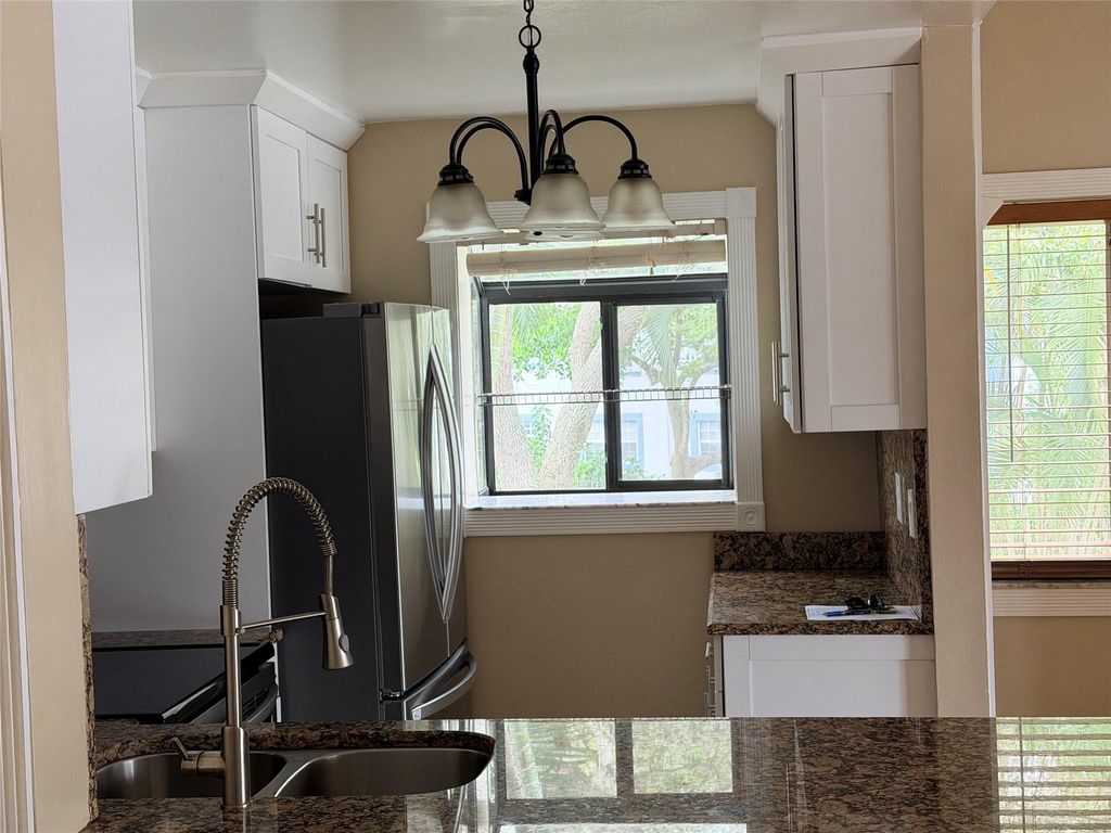 Photo of 2749 S Oakland Forest Drive #203, Oakland Park, FL 33309 (MLS # F10549615)