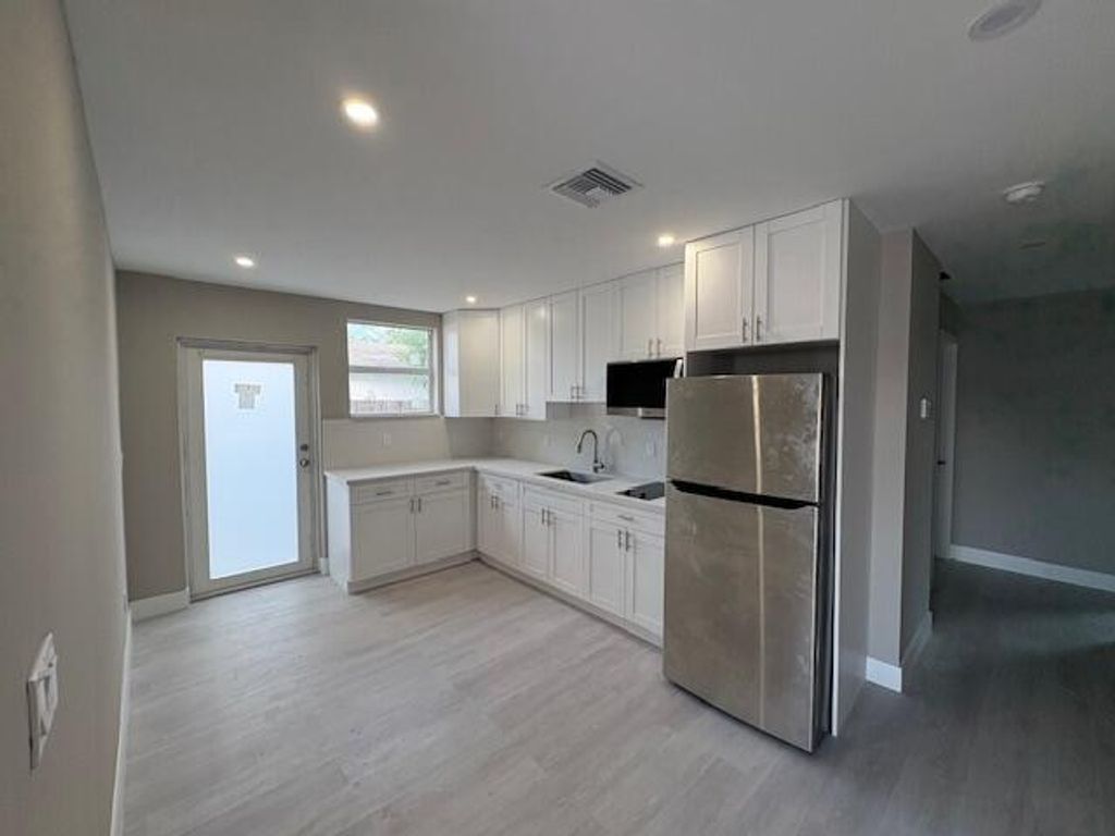 Photo of 5580 Honeysuckle Drive #1st Floor, West Palm Beach, FL 33415 (MLS # R11121156)