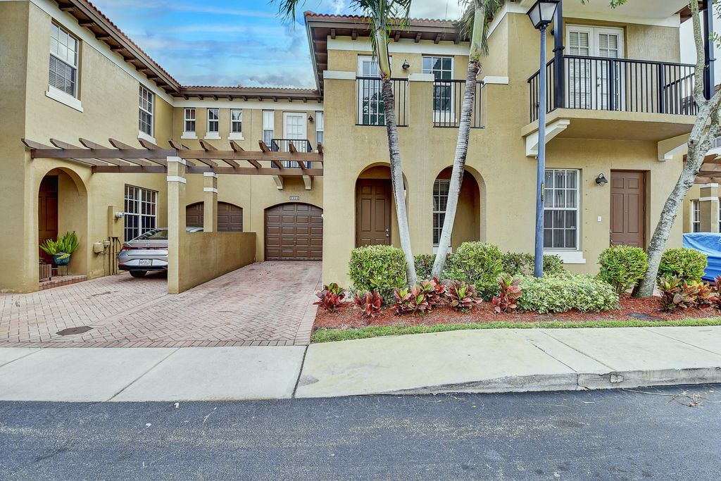 Photo of 6854 Julia Gardens Drive, Coconut Creek, FL 33073 (MLS # R11021298)