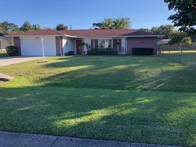 Photo of 6503 Coquina Avenue, Fort Pierce, FL 34951 (MLS # R10769990)