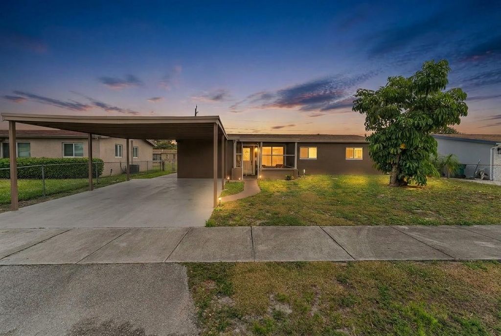 Photo of 1750 NW 35th Terrace, Lauderhill, FL 33311 (MLS # F10556742)