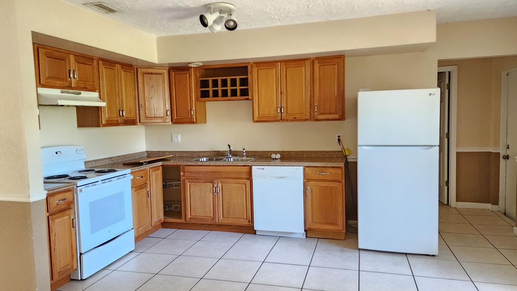 Photo of 342 NE Surrey Street, Port Saint Lucie, FL 34983 (MLS # R11107020)