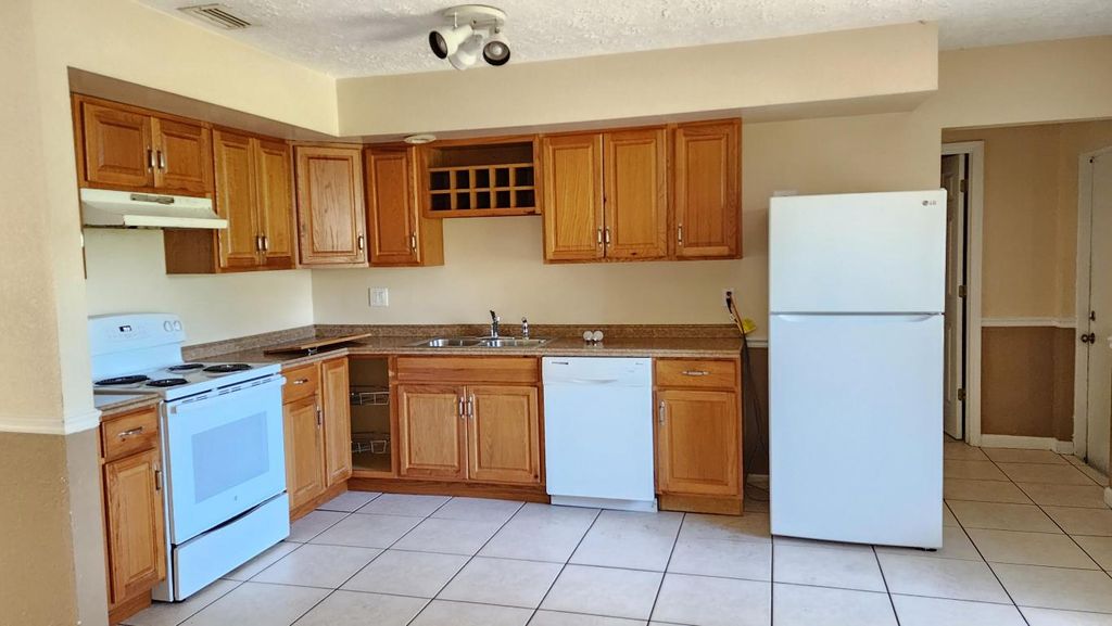 Photo of 342 NE Surrey Street, Port Saint Lucie, FL 34983 (MLS # R11107020)