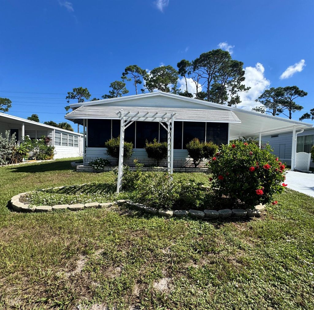 Photo of 19 La Puerta Del Norte, Fort Pierce, FL 34951 (MLS # R11116231)