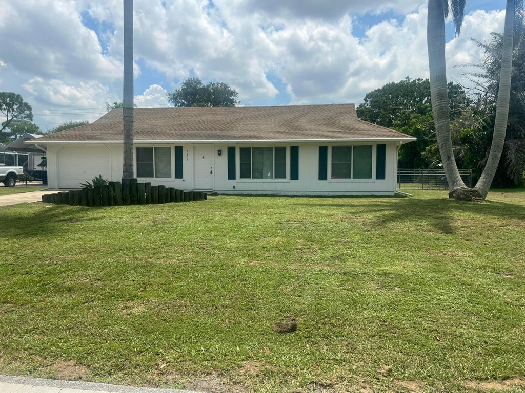 Photo of 7105 NORTH Boulevard, Fort Pierce, FL 34951 (MLS # B26067053)