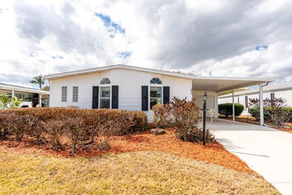 Photo of 8029 Meadowlark Lane, Port Saint Lucie, FL 34952 (MLS # R11165609)