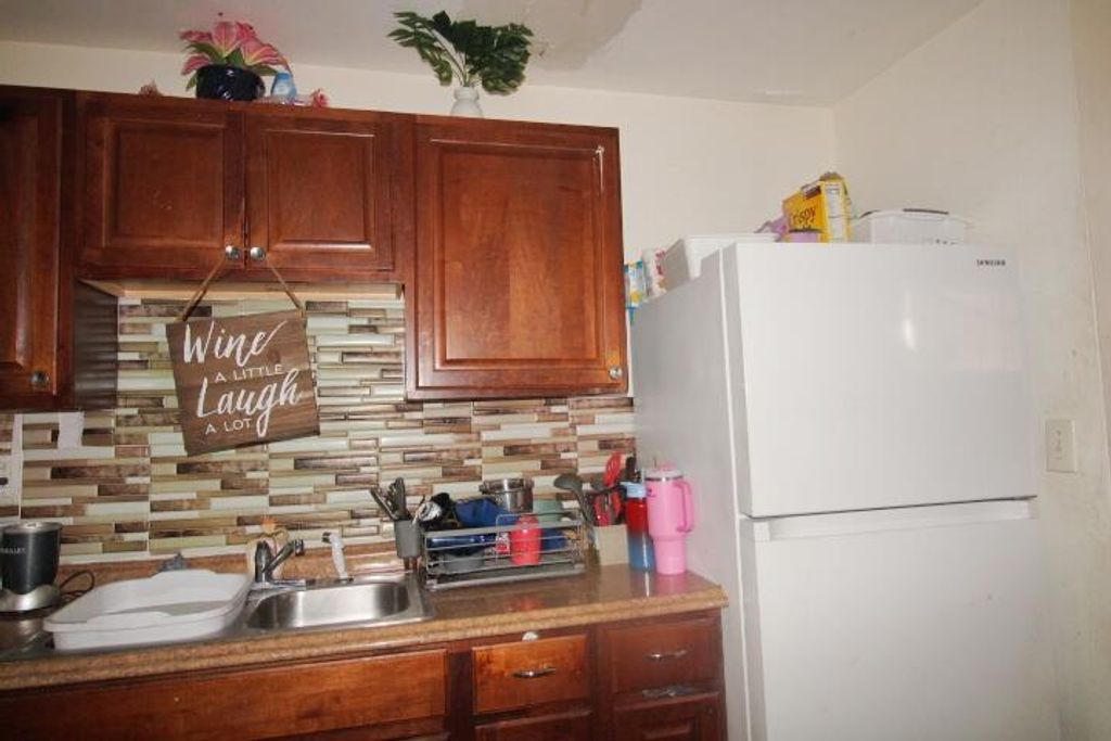 Photo of 5702 Briarwood Street, Mangonia Park, FL 33407 (MLS # R11147562)