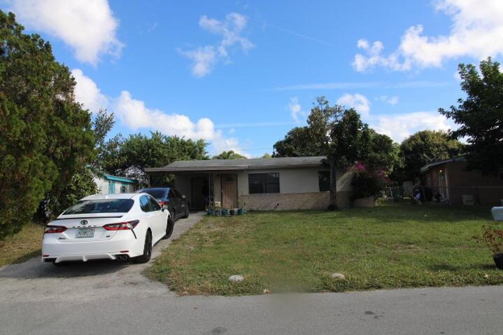 Photo of 5702 Briarwood Street, Mangonia Park, FL 33407 (MLS # R11147562)