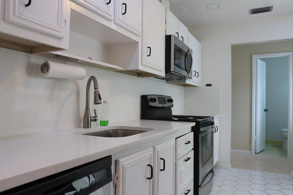 Photo of 280 Cape Cod Circle #A, Lake Worth, FL 33467 (MLS # R11038967)