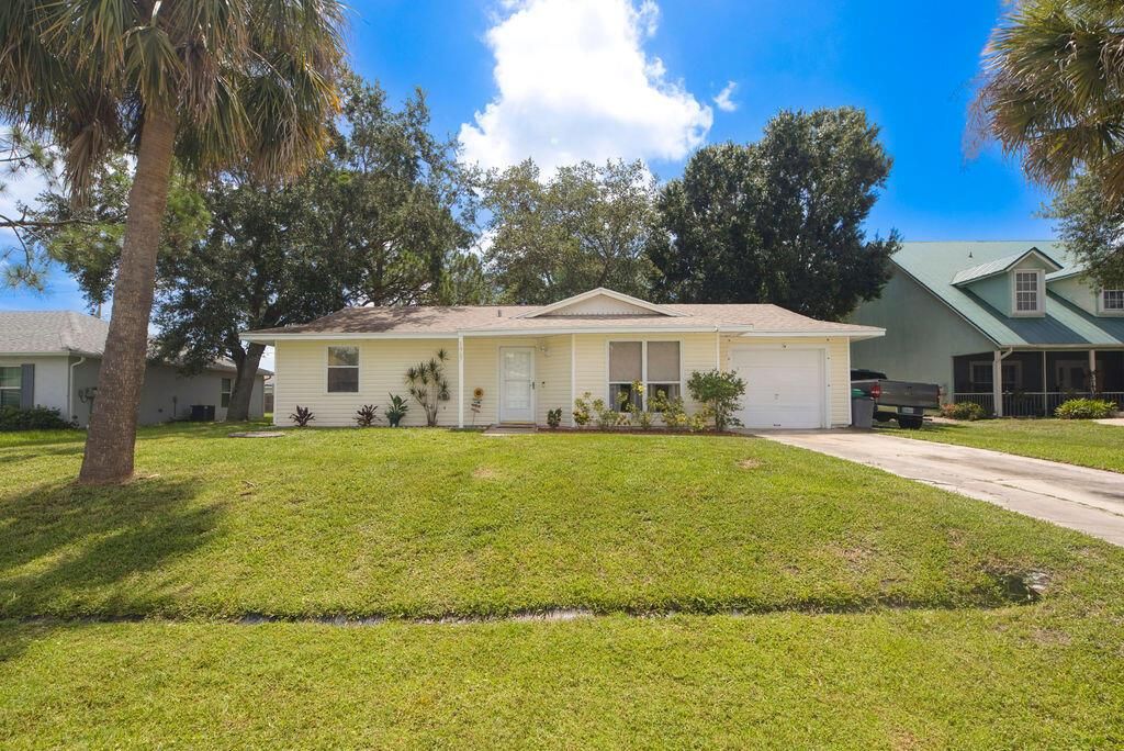 Photo of 1967 SW Ember Street, Port Saint Lucie, FL 34953 (MLS # R11099096)