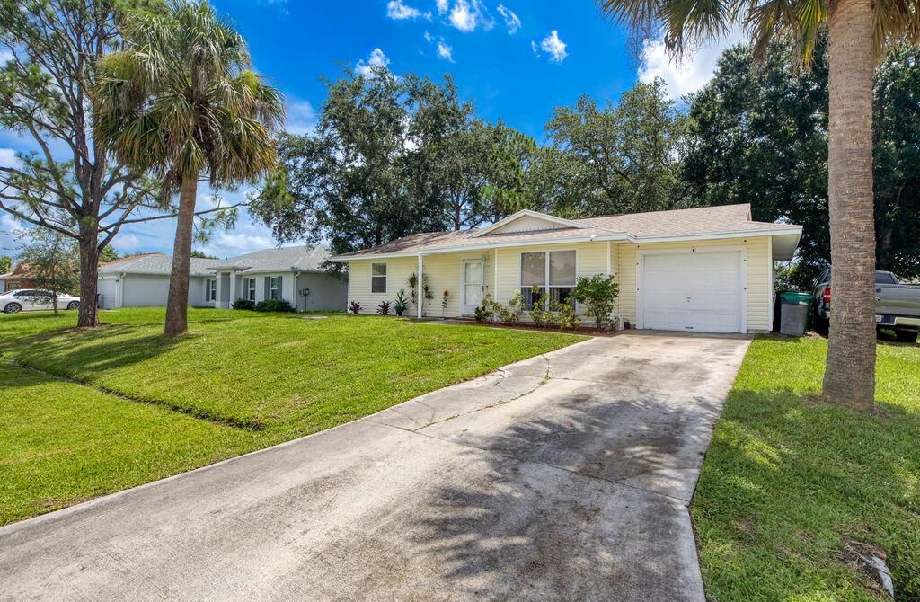 Photo of 1967 SW Ember Street, Port Saint Lucie, FL 34953 (MLS # R11099096)