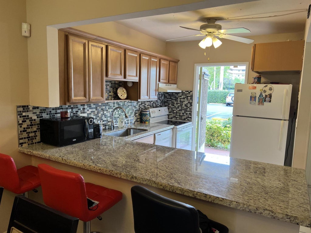 Photo of 5200 Washington Street #101, Hollywood, FL 33021 (MLS # R10782967)