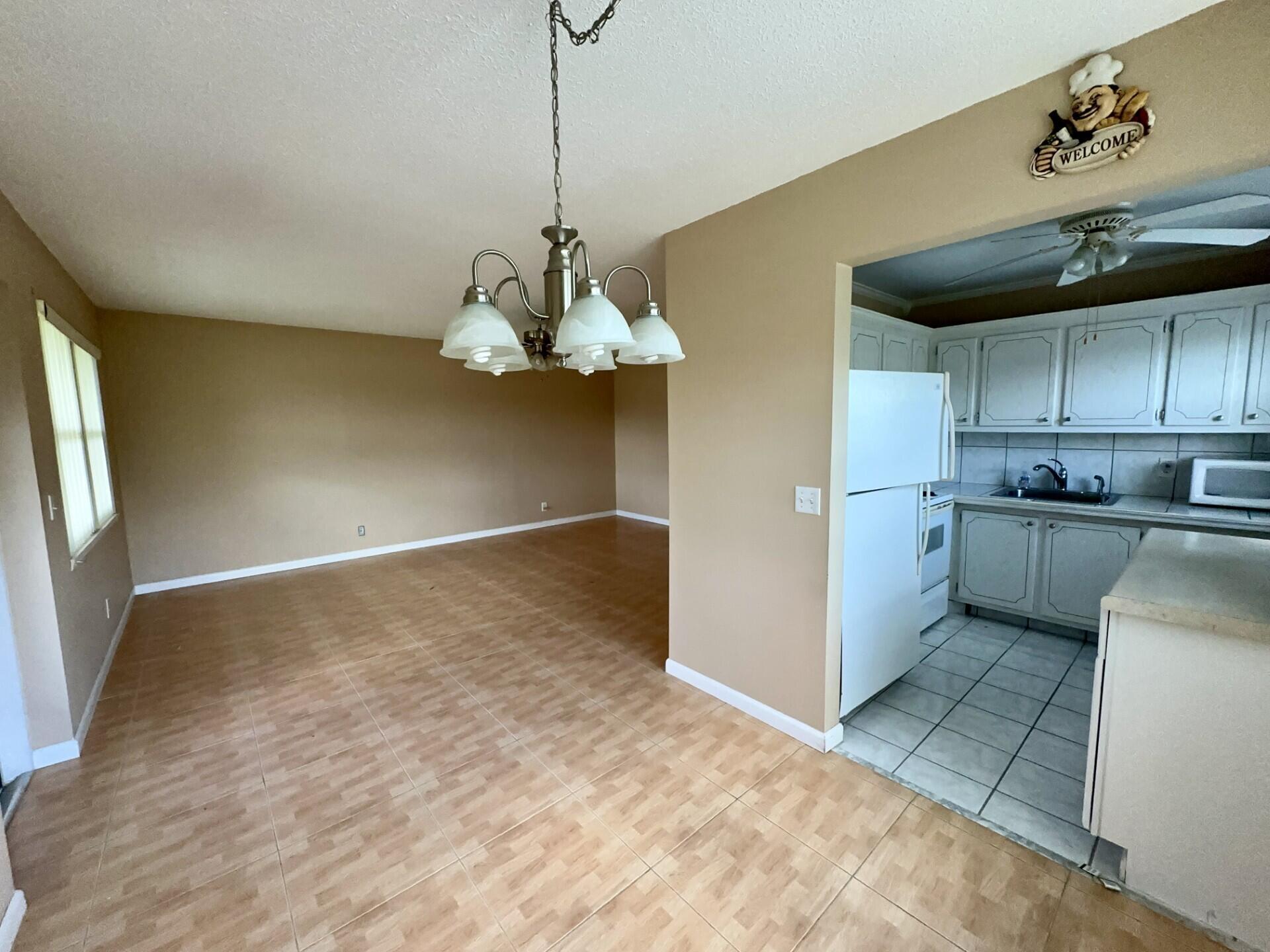 Light & Bright, 2 bedroom, 1.5 bath, second floor, CORNER unit with Updates in 55+ Century Village! Neutral tile flooring throughout this lovely unit. Natural light abounds in this unit. Updated bathrooms, central air conditioning and spacious rooms. Gorgeous impact windows to protect you from hurricanes. Appliance package with NEW STAINLESS appliances available with $100 increase in rent. Century Village is a 55+ community with so much to offer...shows, movies, clubs, pools, security, and transportation service. The Clubhouse features a theater, indoor pool, card room, community/party room, billiard room, shuffleboard, tennis, pickleball, bocce, and two outdoor pools. Numerous heated outdoor pools throughout the community. Separate fitness center with gym.