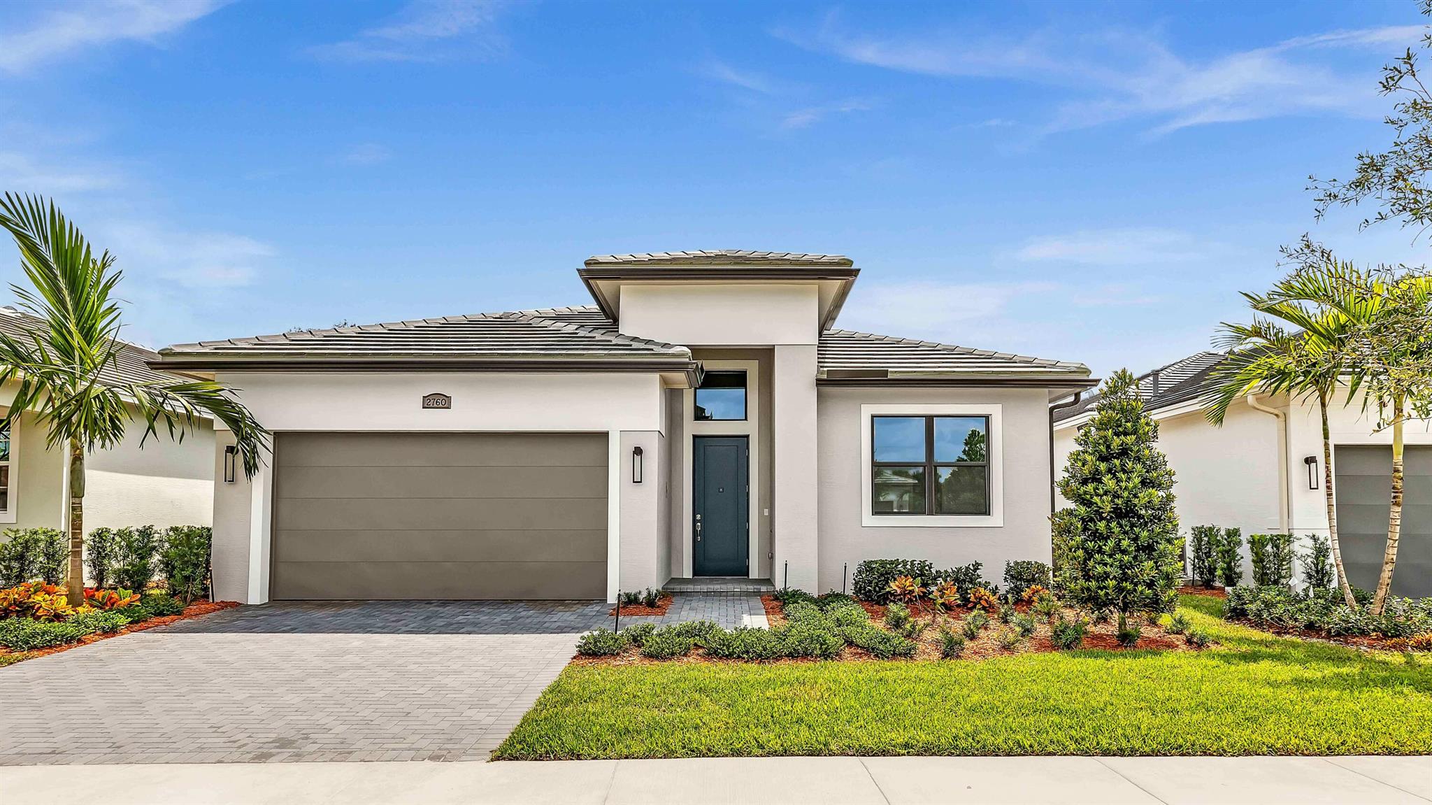 **NEW CONSTRUCTION** Welcome to the Julia a 3-bedroom, 2-bathroom home, nestled within a gated community with no homes behind, this residence offers both privacy and exclusivity. Step inside to discover an open-concept layout bathed in natural light, courtesy of the impressive 16' wide x 10' tall sliding glass doors that enhance the home's southern exposure. The flex room has been thoughtfully converted into a third bedroom, ensuring extra space for family or guests. The chef's kitchen is a masterpiece, boasting 42'' cabinetry, elegant Calacatta Alabaster quartz countertops, a 30'' cooktop, wall oven, and built-in​​‌​​​​‌​‌​​​‌‌​​​‌‌‌​​‌​​‌‌​​​​ microwave.