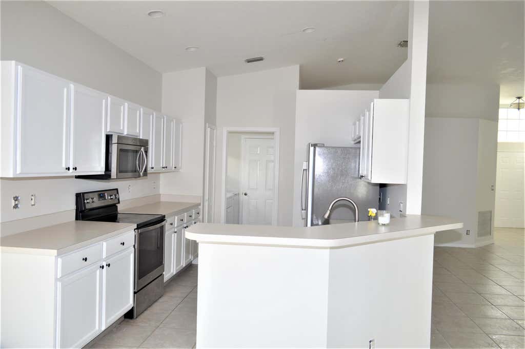 Photo of 880 NW WATERLILY Place, Jensen Beach, FL 34957 (MLS # B26062730)
