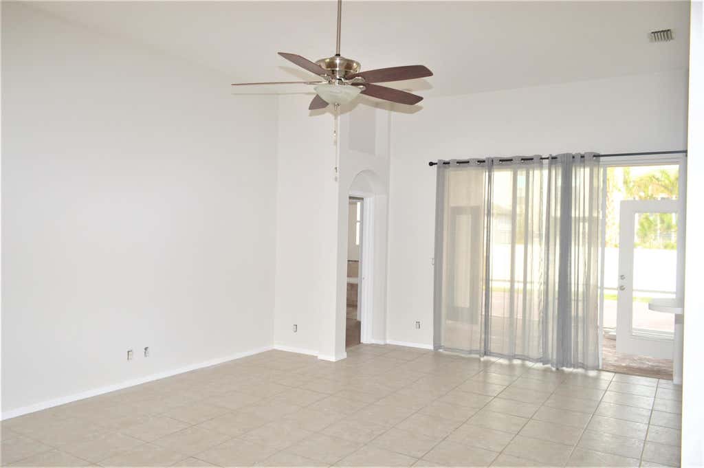 Photo of 880 NW WATERLILY Place, Jensen Beach, FL 34957 (MLS # B26062730)
