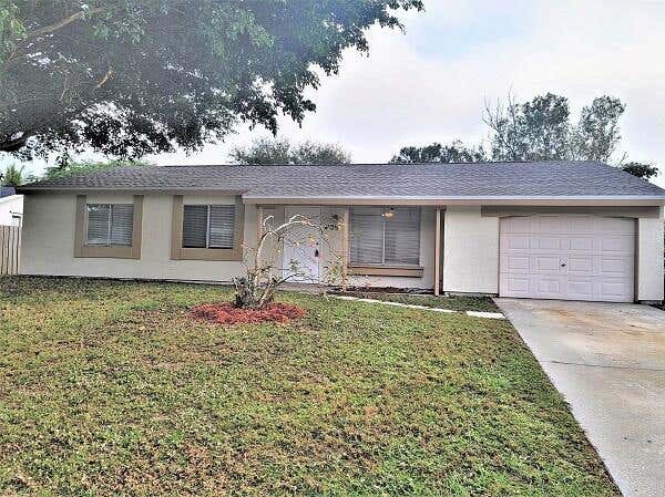 Photo of 209 SW Kentwood Road, Port Saint Lucie, FL 34953 (MLS # R10763687)