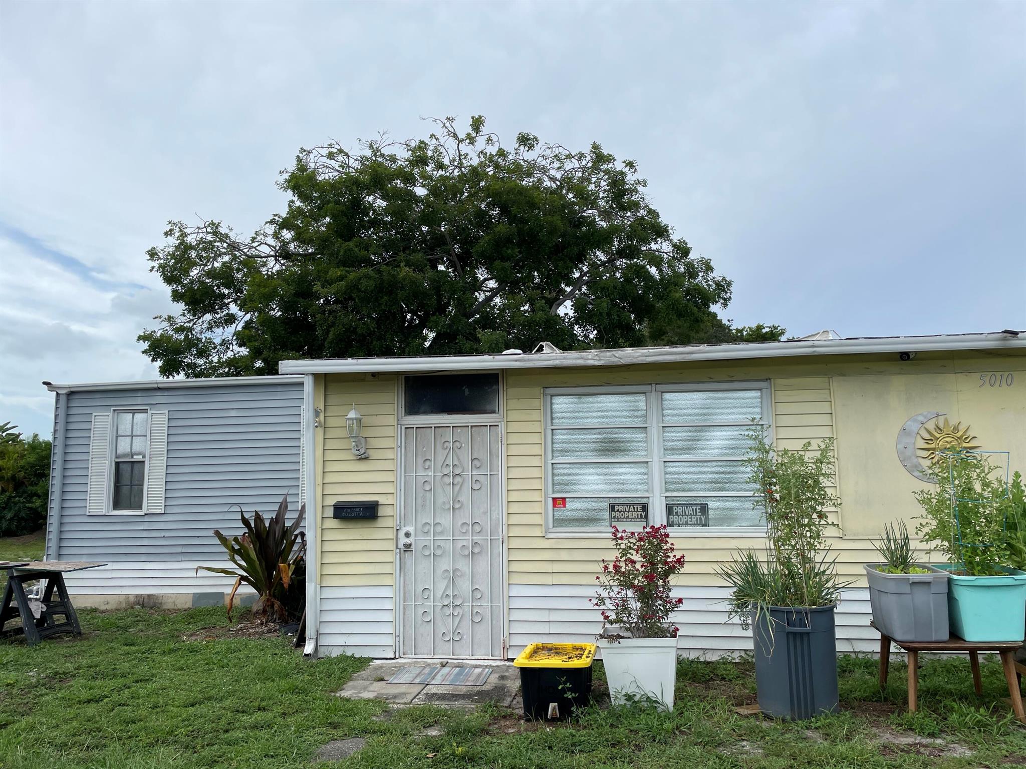 Unique duplex-style mobile home opportunity in the sought-after community of Country Knolls. This updated and partially furnished 2 bed, 2 bath home sits on a corner and is divided into two separate sections, each with its own entrance--perfect for an investment property or multi-generational living. CURRENT TENANT PAYS $1,150 AND IS WILLING TO STAY. You can comfortably live in one side and rent the other.Land Lease of $1,080 covers the land use, as well as community amenities including a pool, pickleball, billiards, clubhouse, and more. Conveniently located just off I-95 near shopping, dining, and more. A rare find with flexibility, privacy, and lifestyle all in one.