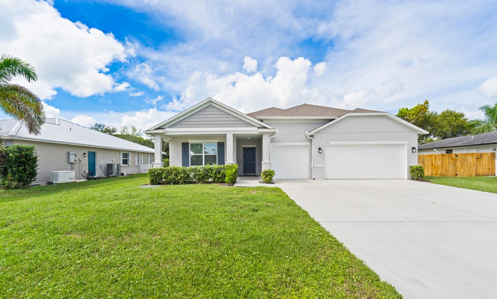Photo of 1862 SE CAMILO Street, Port Saint Lucie, FL 34952 (MLS # B26086938)