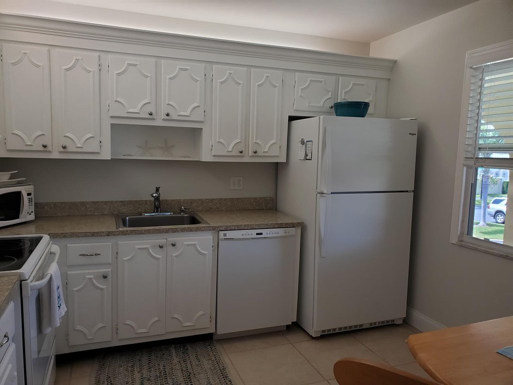 Photo of 717 S Us Highway 1 #211, Jupiter, FL 33477 (MLS # R11096556)