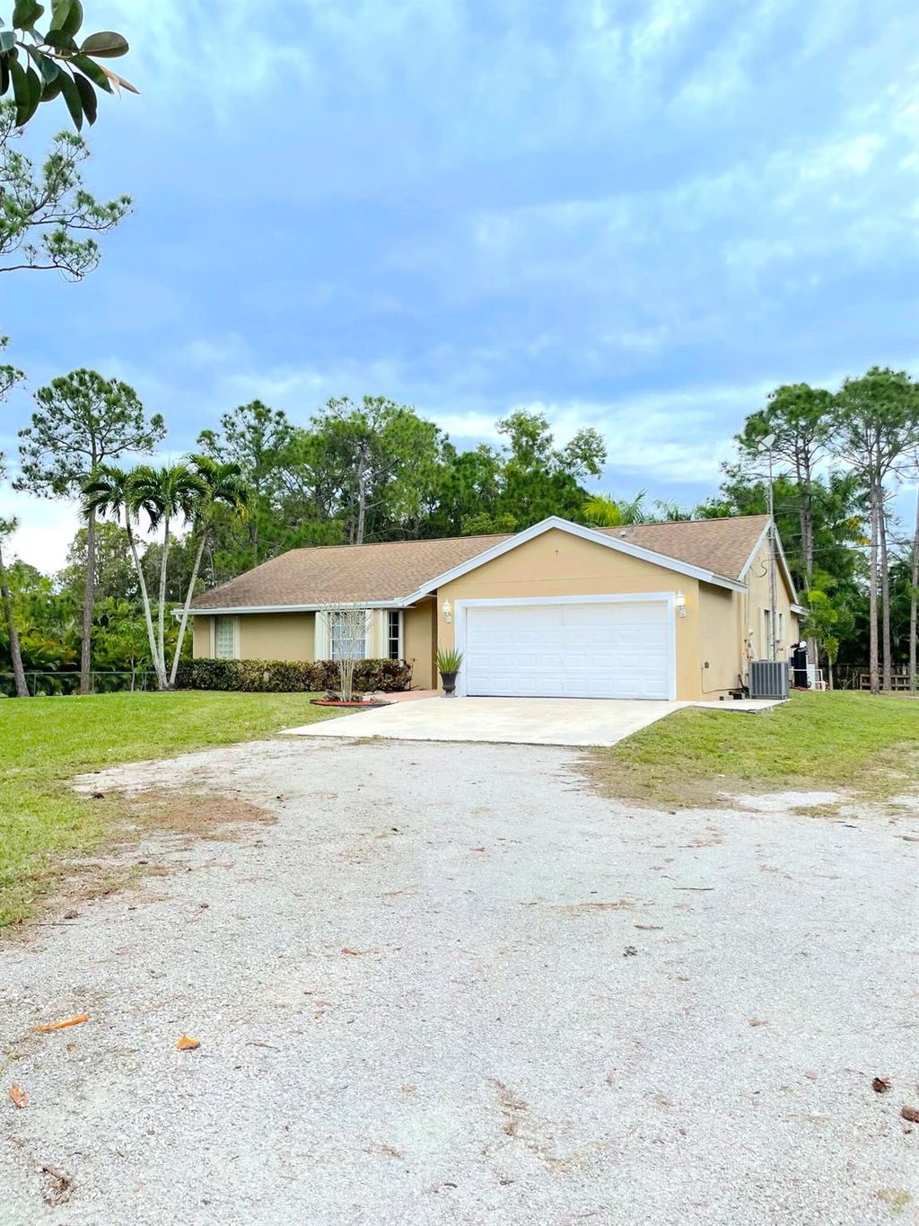 Photo of 15827 Key Lime Boulevard, Loxahatchee, FL 33470 (MLS # R10948699)