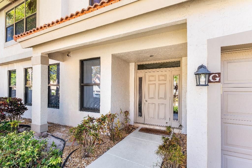 Photo of 5780 Coach House Circle #C, Boca Raton, FL 33486 (MLS # F10554940)