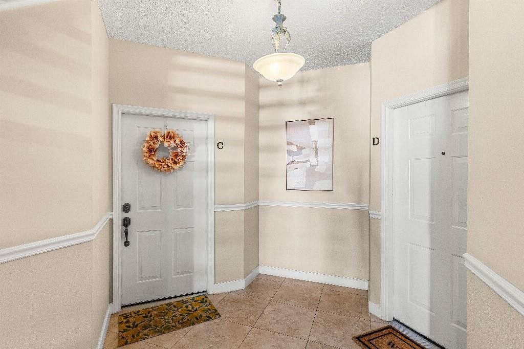 Photo of 5780 Coach House Circle #C, Boca Raton, FL 33486 (MLS # F10554940)