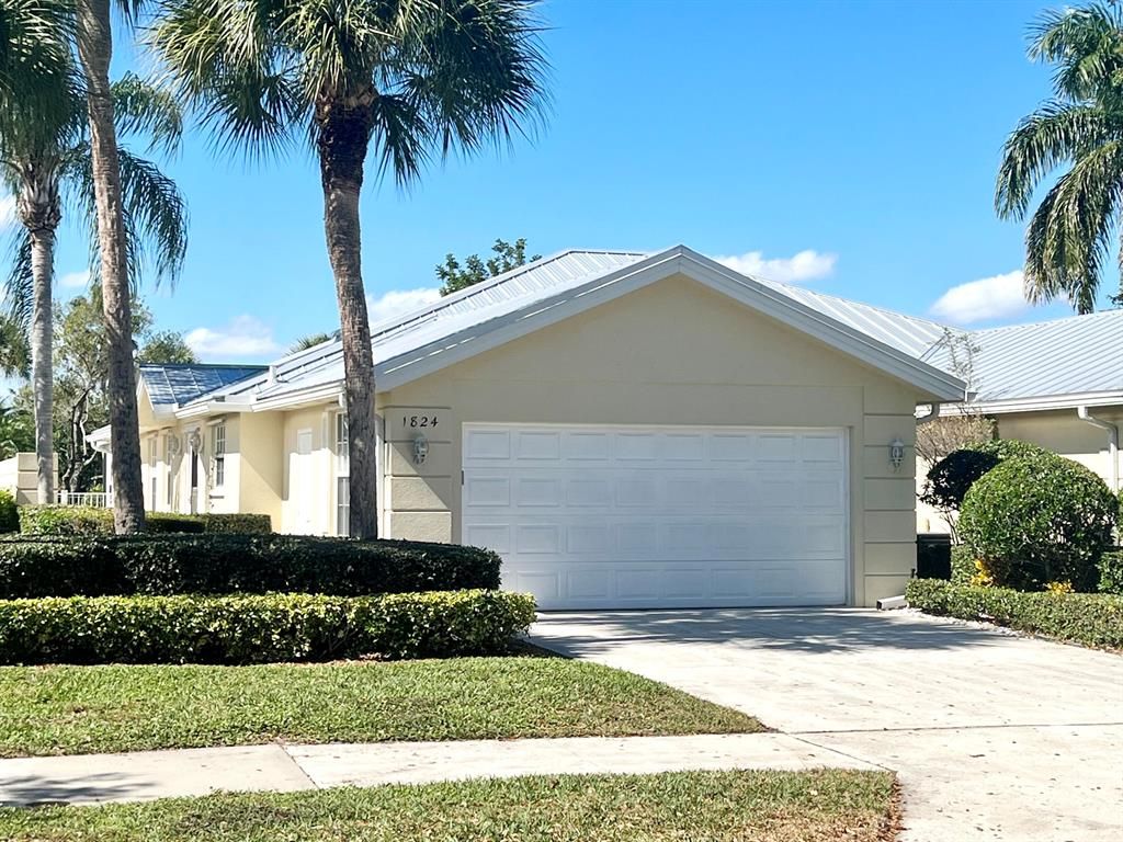 Photo of 1824 SW Waterfall Boulevard, Palm City, FL 34990 (MLS # R10856154)