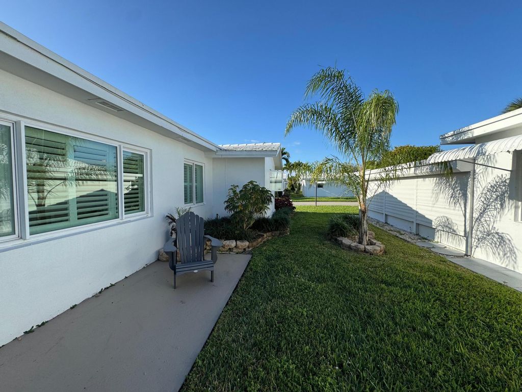 Photo of 2099 SW Lake Circle Drive, Boynton Beach, FL 33426 (MLS # R11166094)