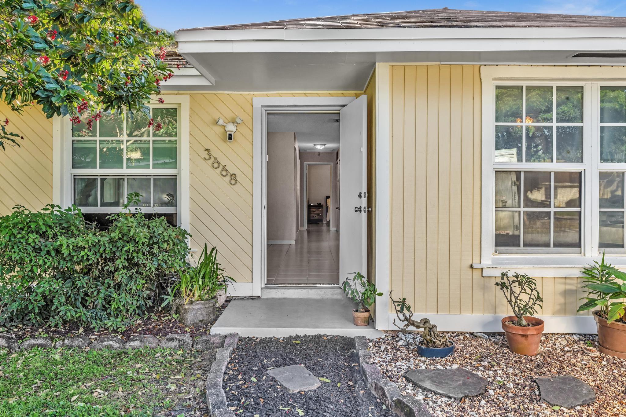 Beautiful 3-bedroom, 2-bathroom home in the sought-after Isla Merita community in Davie. This bright, open-layout home features vaulted ceilings, a spacious kitchen with breakfast nook, and a private screened patio overlooking green space. The primary suite offers ample closet space. Enjoy in-unit laundry and assigned parking right outside your door. Close to parks, top-rated schools, NSU, shopping, and major highways. Move-in ready and waiting for you – schedule your private showing today!