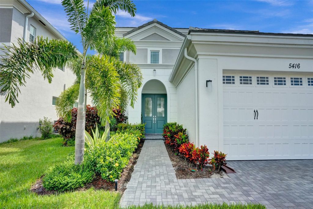Photo of 5416 Macoon Way, The Acreage, FL 33470 (MLS # B26049828)